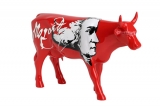 Kráva s portretem Mozarta
